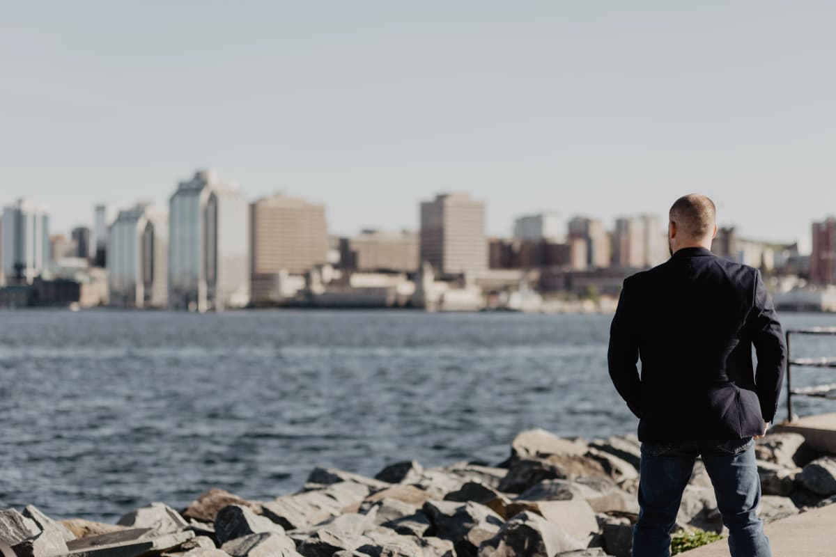 Chris Crowell walking toward a home